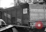 Image of African American driver unloading coal New York United States USA, 1939, second 15 stock footage video 65675035836
