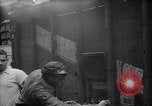 Image of African American driver unloading coal New York United States USA, 1939, second 22 stock footage video 65675035836