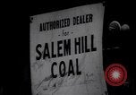 Image of African American driver unloading coal New York United States USA, 1939, second 30 stock footage video 65675035836