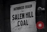 Image of African American driver unloading coal New York United States USA, 1939, second 37 stock footage video 65675035836