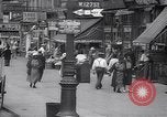 Standbild belebten Markt Geschäfte und Straßen Harlem New York City USA, 1937, aus Sekunde 3 historischem Filmmaterial Videoclip 65675035839
