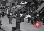 Standbild belebten Markt Geschäfte und Straßen Harlem New York City USA, 1937, aus Sekunde 4 historischem Filmmaterial Videoclip 65675035839
