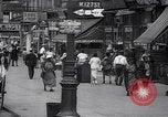Standbild belebten Markt Geschäfte und Straßen Harlem New York City USA, 1937, aus Sekunde 5 historischem Filmmaterial Videoclip 65675035839