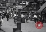 Standbild belebten Markt Geschäfte und Straßen Harlem New York City USA, 1937, aus Sekunde 6 historischem Filmmaterial Videoclip 65675035839