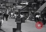 Standbild belebten Markt Geschäfte und Straßen Harlem New York City USA, 1937, aus Sekunde 7 historischem Filmmaterial Videoclip 65675035839