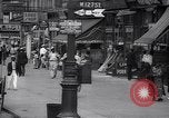 Standbild belebten Markt Geschäfte und Straßen Harlem New York City USA, 1937, aus Sekunde 8 historischem Filmmaterial Videoclip 65675035839