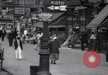 Standbild belebten Markt Geschäfte und Straßen Harlem New York City USA, 1937, aus Sekunde 10 historischem Filmmaterial Videoclip 65675035839