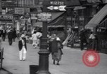 Standbild belebten Markt Geschäfte und Straßen Harlem New York City USA, 1937, aus Sekunde 11 historischem Filmmaterial Videoclip 65675035839