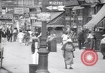 Standbild belebten Markt Geschäfte und Straßen Harlem New York City USA, 1937, aus Sekunde 14 historischem Filmmaterial Videoclip 65675035839