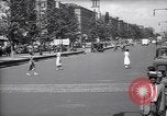 Standbild belebten Markt Geschäfte und Straßen Harlem New York City USA, 1937, aus Sekunde 38 historischem Filmmaterial Videoclip 65675035839