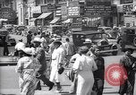 Standbild belebten Markt Geschäfte und Straßen Harlem New York City USA, 1937, aus Sekunde 41 historischem Filmmaterial Videoclip 65675035839
