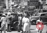 Standbild belebten Markt Geschäfte und Straßen Harlem New York City USA, 1937, aus Sekunde 43 historischem Filmmaterial Videoclip 65675035839
