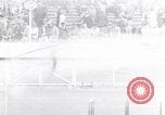 Image of track events between the USA and Britain London England United Kingdom, 1936, second 1 stock footage video 65675035855