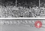 Image of track events between the USA and Britain London England United Kingdom, 1936, second 6 stock footage video 65675035855