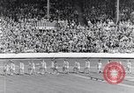 Image of track events between the USA and Britain London England United Kingdom, 1936, second 7 stock footage video 65675035855