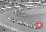 Image of track events between the USA and Britain London England United Kingdom, 1936, second 11 stock footage video 65675035855