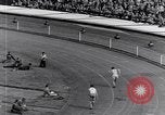 Image of track events between the USA and Britain London England United Kingdom, 1936, second 28 stock footage video 65675035855