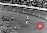 Image of track events between the USA and Britain London England United Kingdom, 1936, second 29 stock footage video 65675035855