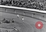 Image of track events between the USA and Britain London England United Kingdom, 1936, second 30 stock footage video 65675035855