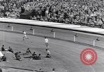 Image of track events between the USA and Britain London England United Kingdom, 1936, second 31 stock footage video 65675035855