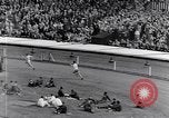 Image of track events between the USA and Britain London England United Kingdom, 1936, second 32 stock footage video 65675035855