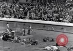 Image of track events between the USA and Britain London England United Kingdom, 1936, second 33 stock footage video 65675035855