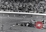 Image of track events between the USA and Britain London England United Kingdom, 1936, second 34 stock footage video 65675035855