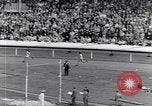 Image of track events between the USA and Britain London England United Kingdom, 1936, second 35 stock footage video 65675035855