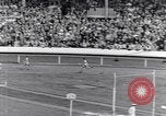 Image of track events between the USA and Britain London England United Kingdom, 1936, second 36 stock footage video 65675035855