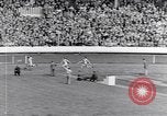 Image of track events between the USA and Britain London England United Kingdom, 1936, second 38 stock footage video 65675035855