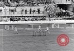 Image of track events between the USA and Britain London England United Kingdom, 1936, second 42 stock footage video 65675035855