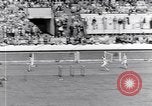 Image of track events between the USA and Britain London England United Kingdom, 1936, second 43 stock footage video 65675035855