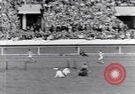 Image of track events between the USA and Britain London England United Kingdom, 1936, second 44 stock footage video 65675035855