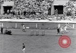 Image of track events between the USA and Britain London England United Kingdom, 1936, second 48 stock footage video 65675035855
