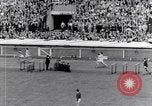 Image of track events between the USA and Britain London England United Kingdom, 1936, second 49 stock footage video 65675035855