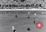 Image of track events between the USA and Britain London England United Kingdom, 1936, second 51 stock footage video 65675035855