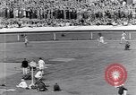 Image of track events between the USA and Britain London England United Kingdom, 1936, second 52 stock footage video 65675035855