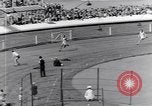 Image of track events between the USA and Britain London England United Kingdom, 1936, second 56 stock footage video 65675035855