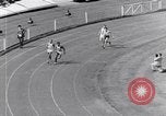 Image of track events between the USA and Britain London England United Kingdom, 1936, second 59 stock footage video 65675035855