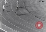 Image of track events between the USA and Britain London England United Kingdom, 1936, second 61 stock footage video 65675035855