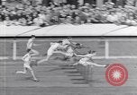 Image of track events between USA and Britain London England United Kingdom, 1936, second 13 stock footage video 65675035856