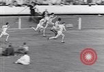 Image of track events between USA and Britain London England United Kingdom, 1936, second 20 stock footage video 65675035856