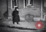 Image of Dutch police break up anti-communist protestors Amsterdam Netherlands, 1956, second 12 stock footage video 65675035859