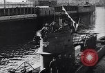 Image of German Navy submarine at a naval base Germany, 1942, second 36 stock footage video 65675035889