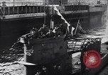 Image of German Navy submarine at a naval base Germany, 1942, second 38 stock footage video 65675035889