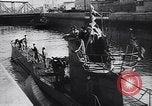Image of German Navy submarine at a naval base Germany, 1942, second 39 stock footage video 65675035889