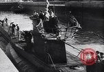 Image of German Navy submarine at a naval base Germany, 1942, second 40 stock footage video 65675035889