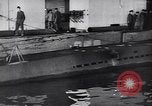 Image of German Navy submarine at a naval base Germany, 1942, second 54 stock footage video 65675035889