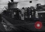 Image of German Navy submarine at a naval base Germany, 1942, second 56 stock footage video 65675035889