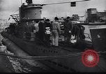 Image of German Navy submarine at a naval base Germany, 1942, second 58 stock footage video 65675035889